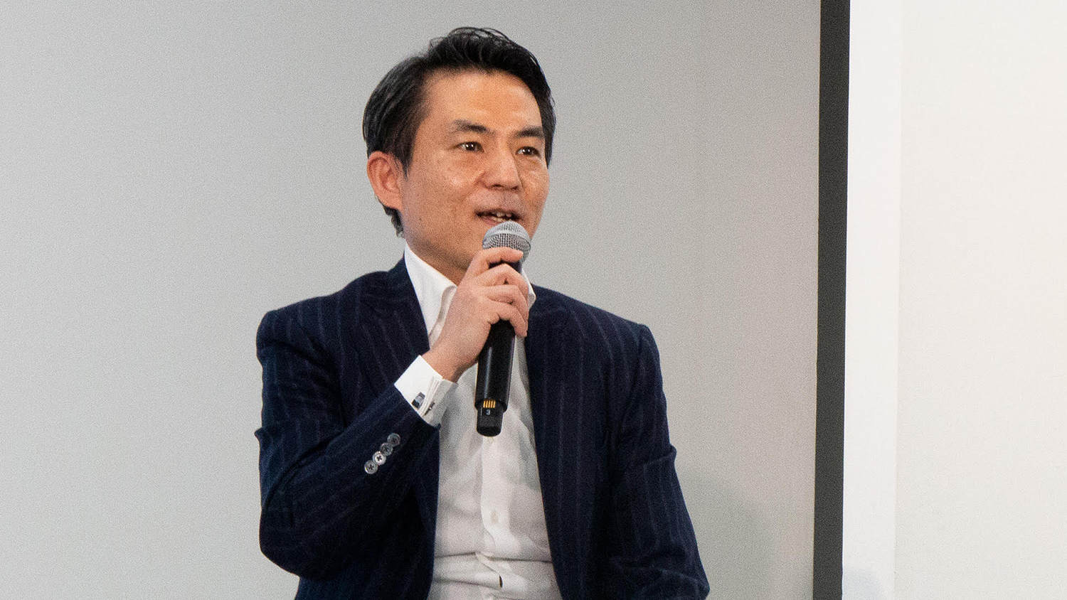 デロイト トーマツ コンサルティングと佐藤琢磨選手がテクニカルパートナーシップ契約
